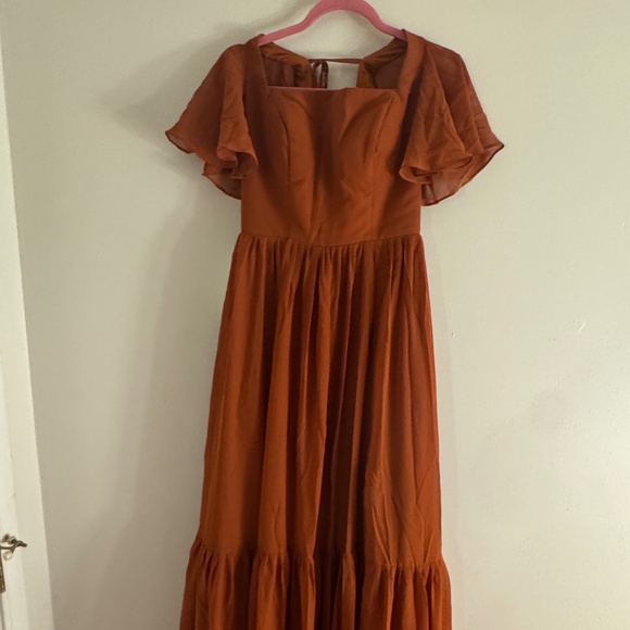 Dresses & Skirts - Size 6 Fall Rust dress. Flutter sleeve with pockets! New with tags!